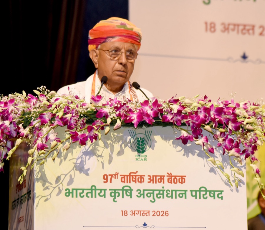 Bhagirath Choudhary speaks at the flower-decked ICAR lectern at the 97th Annual General Meeting