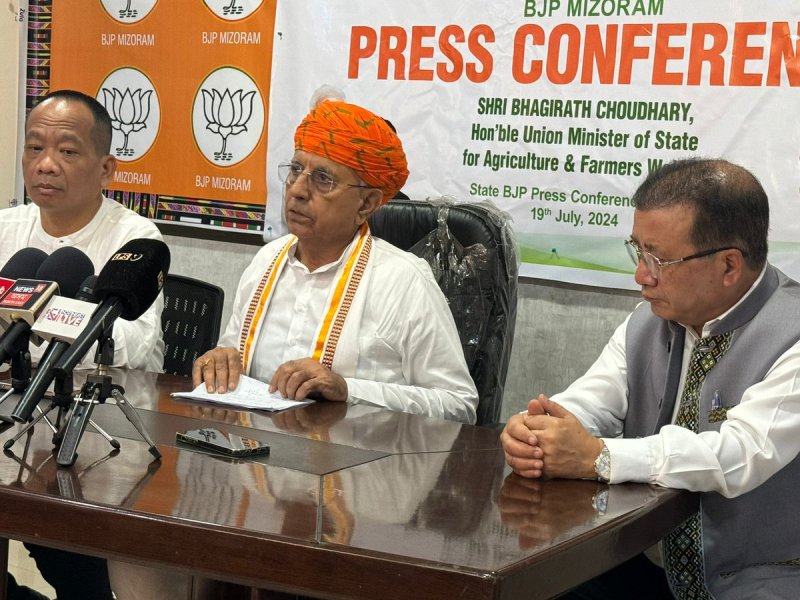 Bhagirath Choudhary at a press conference table in Aizawl