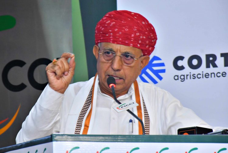 Bhagirath Choudhary gestures while speaking at a FICCI event