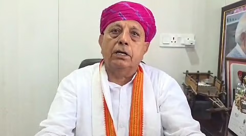Bhagirath Choudhary speaks to camera in an office